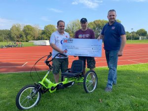 Wheels for All with cheque